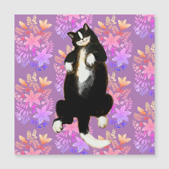 Tuxedo cat Sleeping on floral bed (Front)