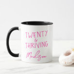 TWENTY & THRIVING 20th Birthday Funny Personalised Mug<br><div class="desc">Celebrate her fabulous twenties with this bold and fun TWENTY & THRIVING mug in vibrant pink – perfect for coffee, tea, or her favourite hot beverage. This personalised 20th birthday gift features a modern, playful design and her name for a unique and thoughtful custom touch. Ideal for best friends, daughters,...</div>