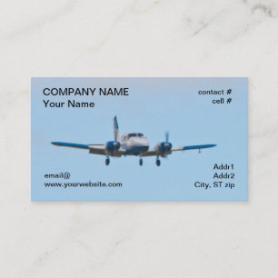 Twin aeroplane on landing approach business card