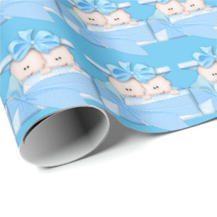 Twin baby boys in presents rapping paper