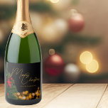 Twinkling Gold Lights Modern Merry Christmas Party Sparkling Wine Label<br><div class="desc">This gorgeous Merry Christmas champagne bottle label features modern gold handwritten script over twinkling lights next to a festive Christmas tree that is decorated with red and green ornaments. Customise these elegant holiday sparkling wine labels for your friends and family with personalised script over the black night sky.</div>