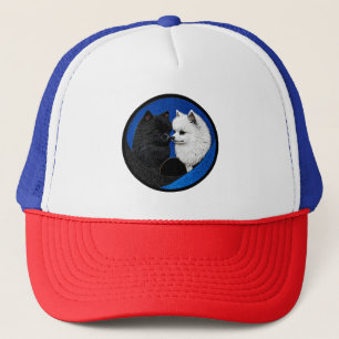 Two adorable spitz dogs trucker hat