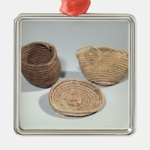 Two baskets and a cover (woven palm fronds) metal tree decoration