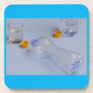 two bottles emptied on hard plastic coaster