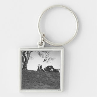 Two boys flying kite on hill B&W Key Ring