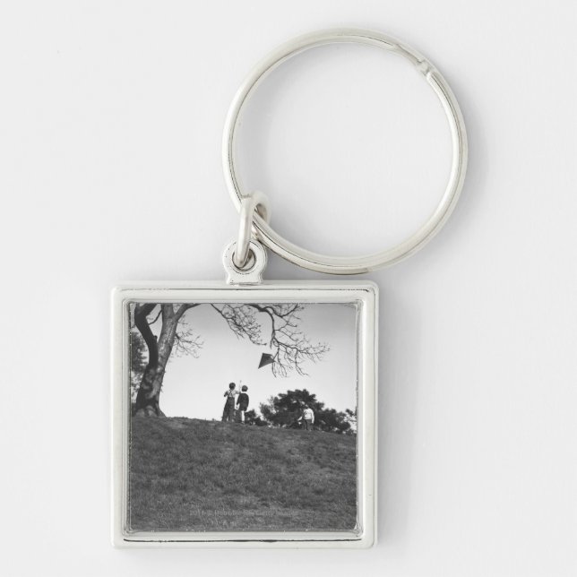 Two boys flying kite on hill B&W Key Ring (Front)