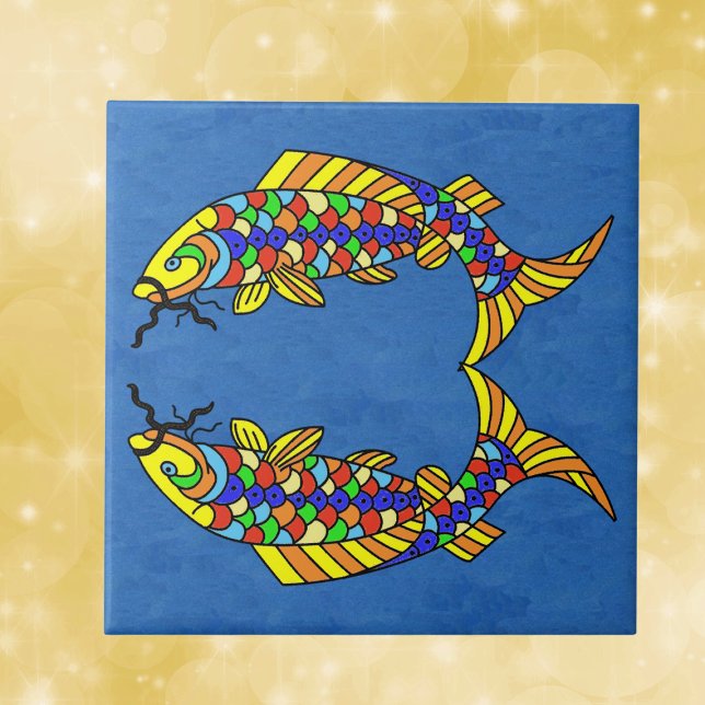 Two Bright Abstract Fancy fish on Deep Blue Tile (Two fancy fish with scales in  bright bold multiple colours on dark blue decorative ceramic tile.)
