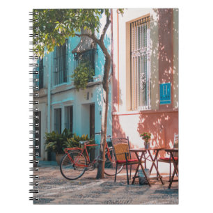 Two brown table outside notebook