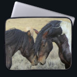 Two Brown Wild Horses Nuzzling Laptop Sleeve<br><div class="desc">A pair of brown wild horses sharing a tender moment in a grassy field. These two brown paint horses can be seen gently nuzzling each other,  enjoying each others company. Their tousled manes blowing in the breeze. Displaying power,  kindness and freedom. Great for horse lovers.</div>