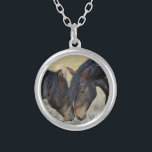 Two Brown Wild Horses Nuzzling Silver Plated Necklace<br><div class="desc">A pair of brown wild horses sharing a tender moment in a grassy field. These two brown paint horses can be seen gently nuzzling each other,  enjoying each others company. Their tousled manes blowing in the breeze. Displaying power,  kindness and freedom. Great for horse lovers.</div>