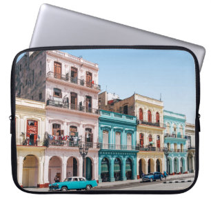 TWO CARS PARKED OUTSIDE BUILDING LAPTOP SLEEVE