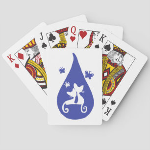 Two cats playing cards