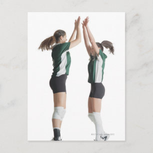 two caucasian female volleyball players from the postcard