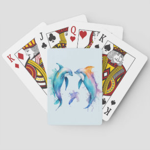 Two cute dolphins playing cards