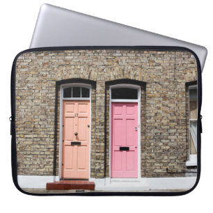 TWO DOORS TOGETHER DURING DAYTIME LAPTOP SLEEVE