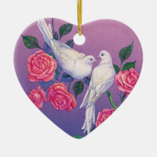 Two doves and flowers on a heart ceramic tree decoration