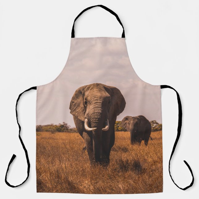 TWO ELEPHANTS WALKING ON GRASS COVERED GROUND APRON (Front)