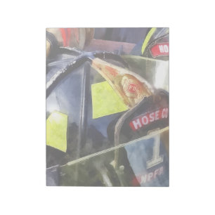 Two Fire Helmets And Fireman's Jacket Notepad