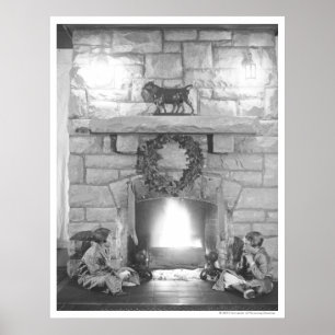 Two girls sitting by a fireplace at Christmas Poster