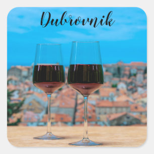 Two glasses of red wine with view of Dubrovnik Square Sticker