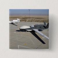 Two Global Hawks parked on a ramp