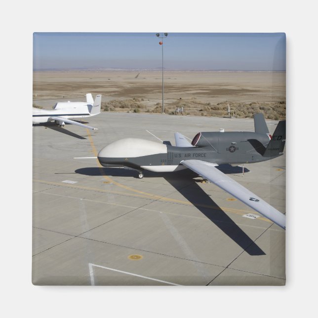 Two Global Hawks parked on a ramp Magnet (Front)