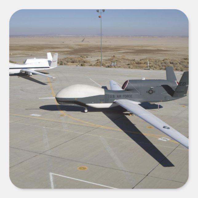 Two Global Hawks parked on a ramp Square Sticker (Front)