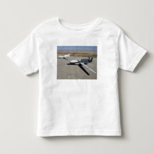 Two Global Hawks parked on a ramp Toddler T-Shirt