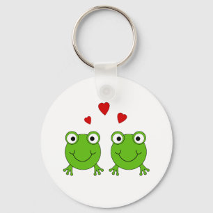 Two green frogs with red hearts. key ring
