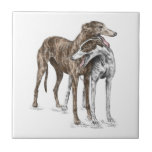 Two Greyhound Friends Dog Art Tile<br><div class="desc">This artwork featuring a pair of Greyhound dogs - buddies and friends - was created by pencil artist Kelli Swan. The original black and white pencil drawing has been hand-tinted with colour details on the dogs to create this final look. The artwork is titled "Lean on Me". Kelli Swan specialises...</div>