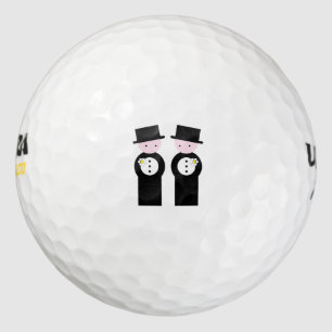 Two grooms golf balls