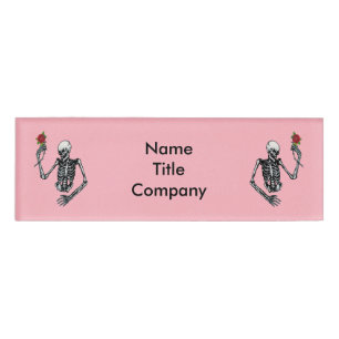 Two Half Skeletons Raised Arms Holding Red Roses Name Tag