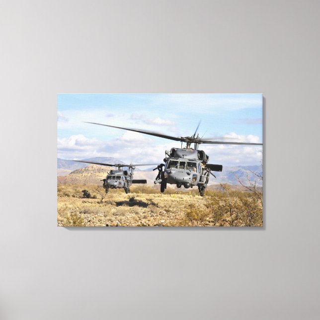 Two HH-60 Pavehawk helicopters preparing to lan Canvas Print (Front)