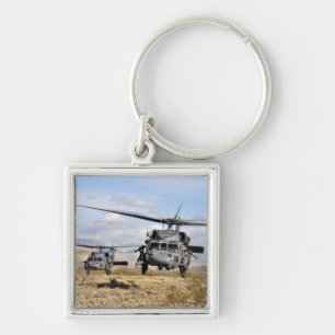 Two HH-60 Pavehawk helicopters preparing to lan Key Ring