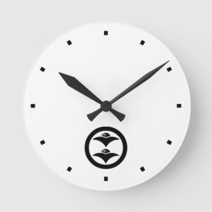 Two karigane in a circle round clock