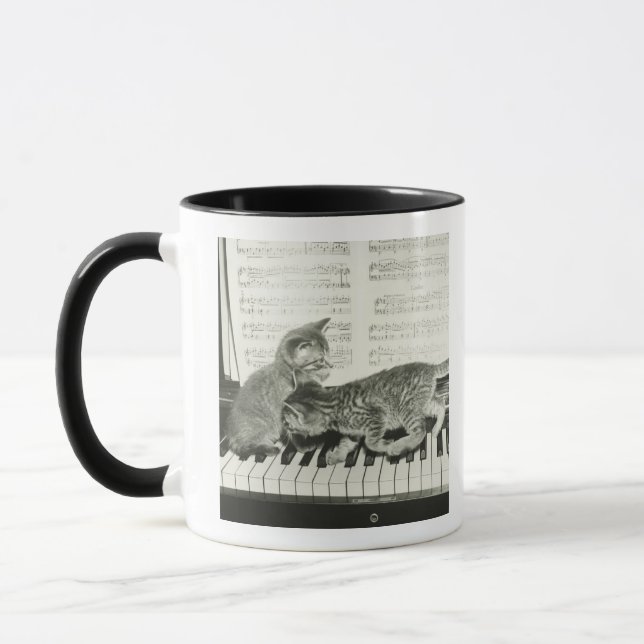 Two kitten playing on piano keyboard, (B&W) Mug (Left)