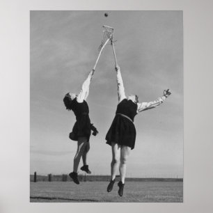 Two lacrosse players jump for the ball. poster