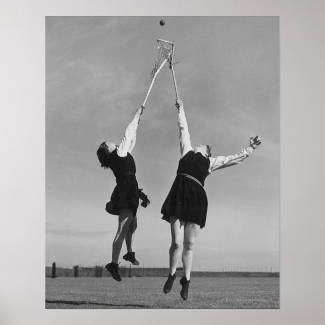 Two lacrosse players jump for the ball. poster (Front)