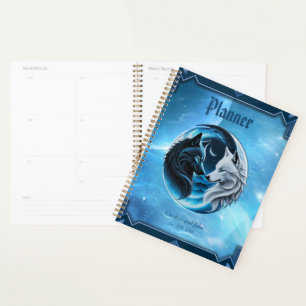 Two majestic wolf heads planner