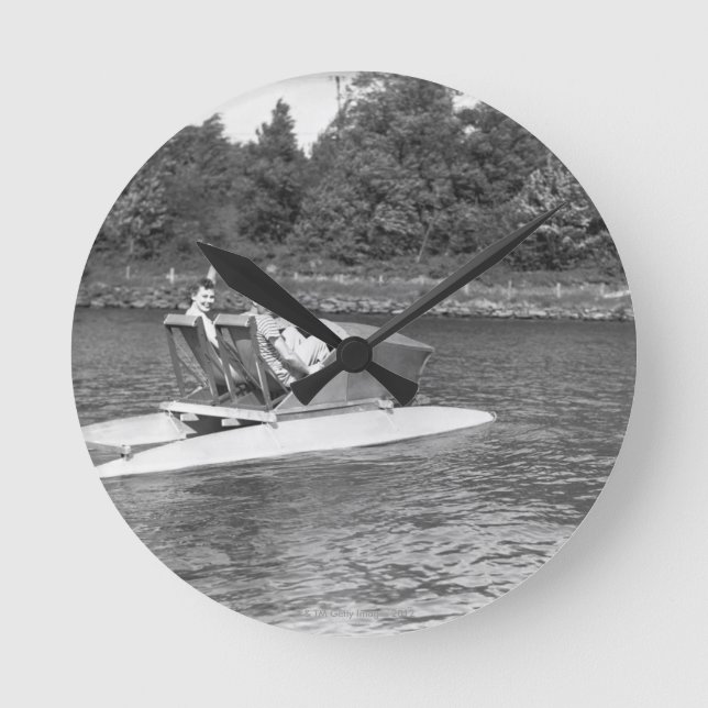 Two Men Round Clock (Front)