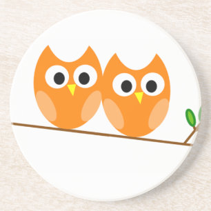 Two Orange Owls in Tree Coaster