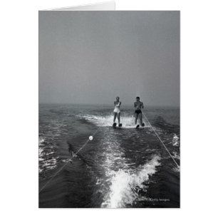 Two people waterskiing