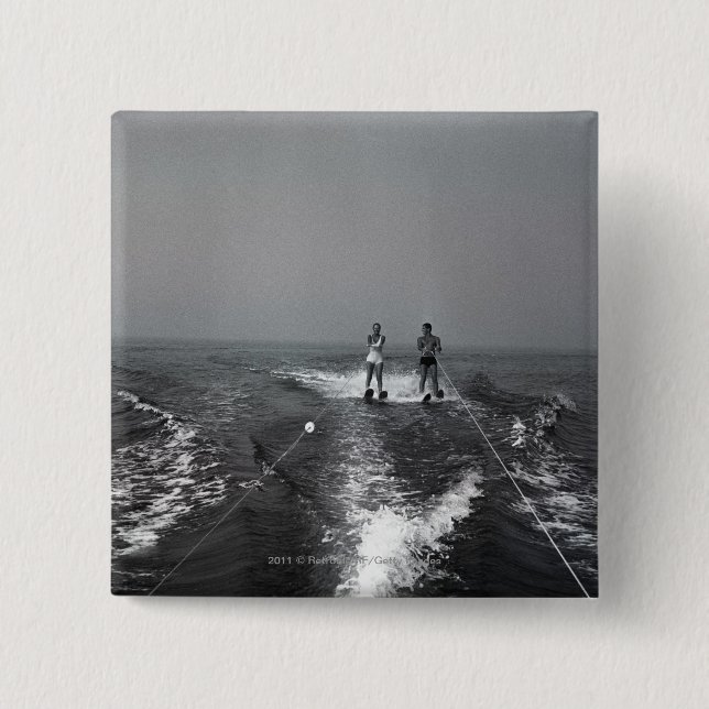 Two people waterskiing 15 cm square badge (Front)