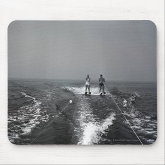 Two people waterskiing mouse mat