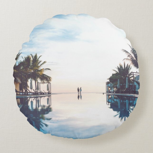 Two person standing beside swimming pool round cushion (Front)