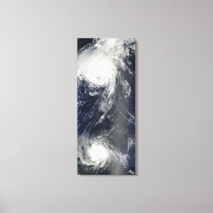 Two powerful storms span the Atlantic Ocean Canvas Print
