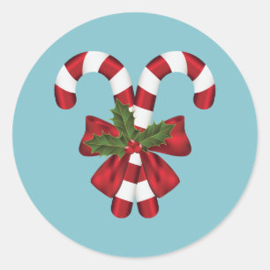Two Red And White Candy Canes On Blue Classic Round Sticker