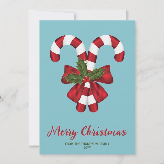 Two Red And White Candy Canes On Blue With Text Holiday Card (Front)