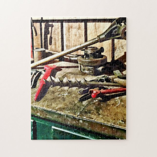 Two Red Wrenches on Plumber's Workbench Jigsaw Puzzle (Vertical)