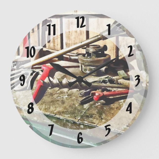Two Red Wrenches on Plumber's Workbench Large Clock (Front)